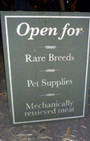Village Pet Store and Charcoal Grill - Banksy, with a side of fashion disturbia