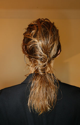 The Wet Look: A sculptural and edgy ponytail.