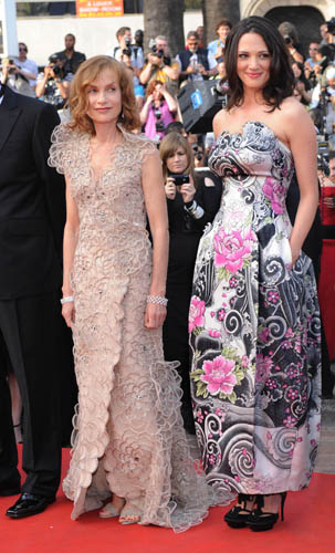 Isabelle Huppert, French actress and President of Jury, in Gioergio Armani PrivA© champagne colour plunging V-neck double-breasted robe-manteau, with all-over silk organza and rhinestone floral embroidery. Asia Argento, member of the Jury, in Giorgio Armani PrivA© silk pagoda style dress with a Coromandel inspired floral print and inlaid motifs, and Swarovski crystals and feature on the top. Isabelle Huppert, French actress and President of Jury, in Gioergio Armani PrivA© champagne colour plunging V-neck double-breasted robe-manteau, with all-over silk organza and rhinestone floral embroidery. Asia Argento, member of the Jury, in Giorgio Armani PrivA© silk pagoda style dress with a Coromandel inspired floral print and inlaid motifs, and Swarovski crystals and feature on the top.