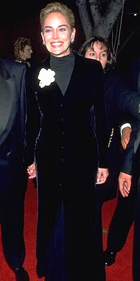 Sharon Stone wore a GAP T-Shirt with her couture to the 1996 Oscars and made fashion history for her personal style bravado and timeless chic.